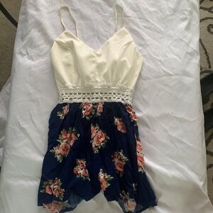 Love Tree size small skort with floral print on bottom and white on top